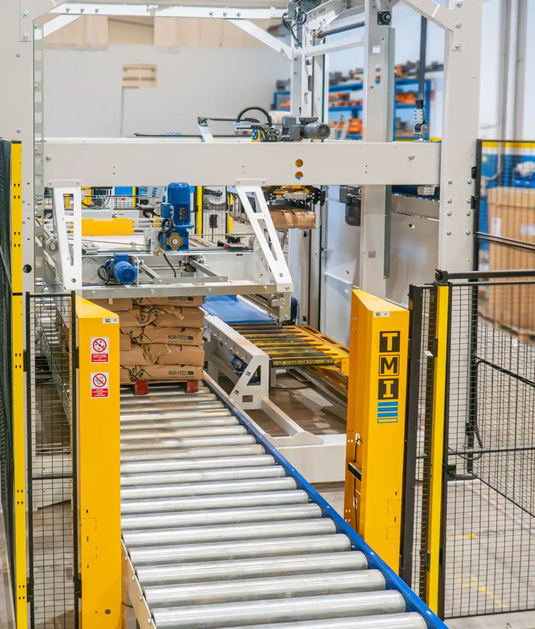 paletizadora-automatica-de-entrada-nivel-bajo-con-pinza-robotizada-ILERPAL L-7